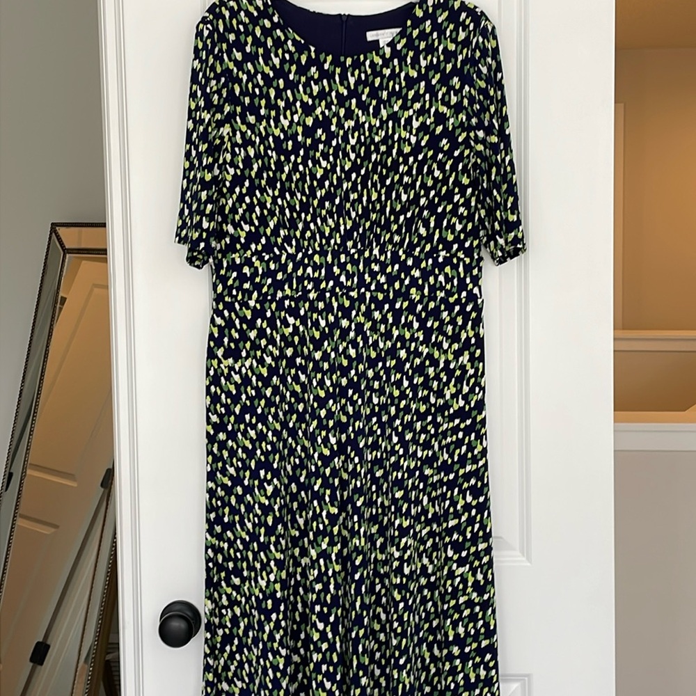 London Times dress in fantastic navy and green shades.